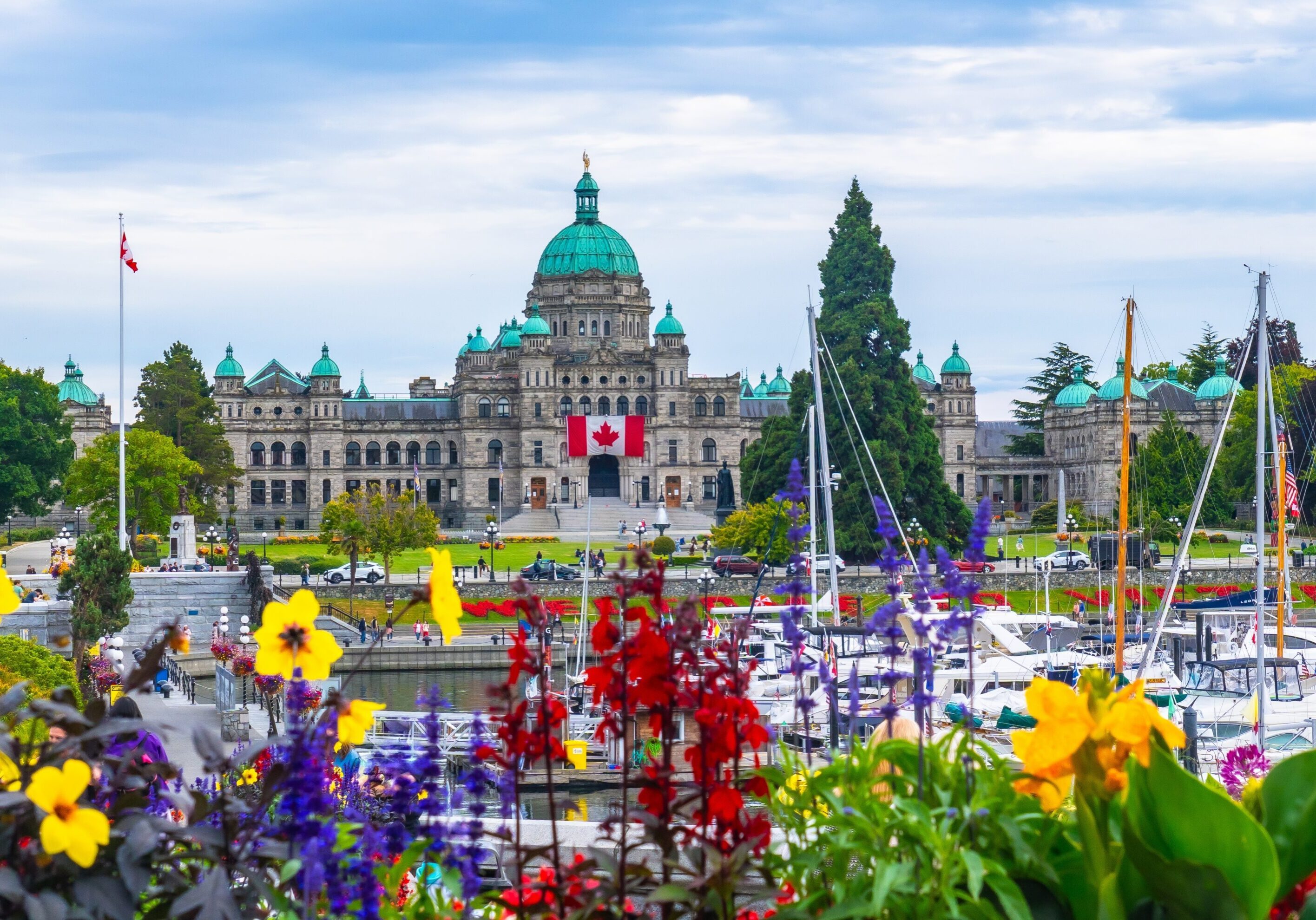 Colorful,Flowers,Decorate,The,Inner,Harbour,With,The,British,Columbia
